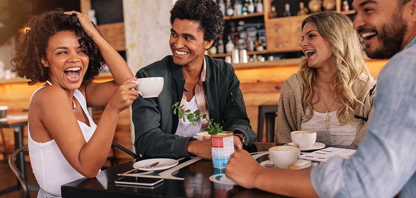 people chatting over coffee